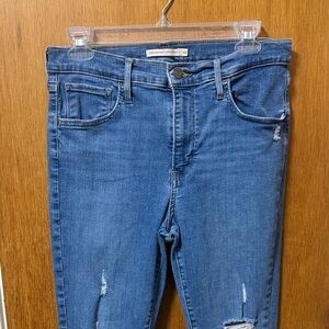 720 Levi's Distressed Blue High Rise Super Skinny Jeans